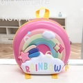 Close-up of 3D embossed rainbow and star patterns on pink EVA hardshell kids backpack - Pink Yellow