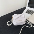 Mini lichtroze handtas met parelriem en grote strik voor meisjes als crossbody tas - Wit