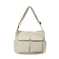 Cream canvas messenger bag with dual front pockets and adjustable strap - Off White