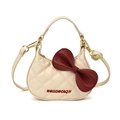 Beige kids quilted cat style crossbody bag with large red bow and top handle - White