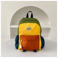 Front detail of ANALUCK color-block kids backpack with yellow, green and orange panels - Large / Orange
