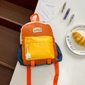 Kids backpack in orange navy blue and yellow color block with star charm accessory - Medium / Yellow