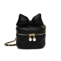 Black quilted mini bucket bag with leather bow and pearl zippers on white background - Black