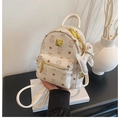 White mini backpack with cute cat prints, brown diamonds, and a gold metal chain accent - Beige Bare Bag