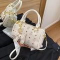 Beige Boston shoulder bag featuring cartoon cat patterns and a cute dog charm detail - Bare Bag / Off White