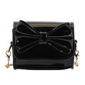 Mini black patent leather crossbody bag with large bow detail and gold chain strap - Black