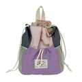 Mochila de mujer con cordón en colores contrastados con diseño de patchwork y bolsillos de malla - Morado