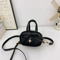 Mini black leather tote bag for girls with a cute bow knot and gold heart pendant - Black
