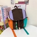 Zaino colorato patchwork con coulisse, ciondolo a coniglio verde e patta marrone - Con Ciondolo / Marrone
