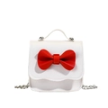 Girl's mini white leather shoulder bag with a large red bow and silver chain strap - Off-white
