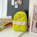 Sac à dos enfant vert fluo en nylon avec poche avant crème contrastée et détails rayés sur le côté - Vert Herbe