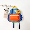 Toddler backpack with blue and orange contrast colors and a yellow lion charm - Medium / Blue