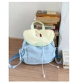 Detail of light blue fruit-themed school bag with apple slice design and drawstring closure - Green Pear