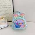 Light blue quilted mini backpack with rainbow sequin bow and colorful summer motif - Blue