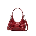 Chic red patent leather mini handbag featuring a large 3D bow and adjustable strap - Red