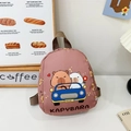 Pink cartoon capybara backpack with car illustration and durable brown straps - Brown