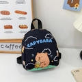 Black Capybara mini backpack for kids featuring a cartoon graphic and canvas material - Black