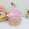 Pink mini backpack for kids featuring shiny wings and a yellow crown print - Pink