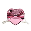 Pink heart-shaped laser surface bag for girls with a large bow and pearl chain strap - Pink