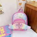 Pink sequin toddler backpack with rainbow wings and heart gem in a cute room setting - Rose Red