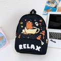 Cute black capybara backpack for students with a cartoon relax print on canvas fabric - Black