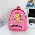 Pink cartoon backpack featuring a cute capybara print for school children - Rose Pink