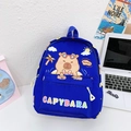 Blue kids backpack featuring a cute cartoon capybara print and island motifs - Sapphire Blue