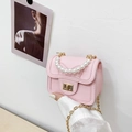 Pink mini crossbody bag featuring pearl handle and gold chain for young girls - Pink