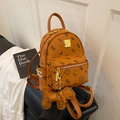 Brown mini backpack featuring cat and bow prints with a cute dog-shaped charm - Bare Bag / Yellow
