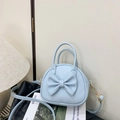 Borsa a tracolla celeste per bambine con fiocco decorativo e pelle testurizzata antigraffio - Blu