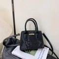 Elegant black snake-pattern mini handbag with gold metal bar and top handles - Black (Bag Only)