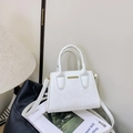 White faux leather shoulder bag with snakeskin texture and elegant silk scarf handle - White Naked Bag
