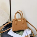 Brown faux snakeskin mini handbag with twin handles and a thin adjustable shoulder strap - Brown (Bag Only)