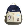 Mochila infantil azul marino y crema con parches coloridos y detalles bordados - Azul