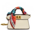 Mini cream chain handbag for girls featuring a decorative silk scarf on the handle - White With Silk Scarf