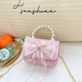 Minibolso rosa para niña con lazo grande de encaje, flores y asa de perlas - Rosa