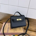 Mini black lychee leather crossbody bag with vintage golden twist lock for kids - Black