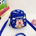 Blue kids capybara crossbody bag featuring summer vacation print and adjustable strap - Blue