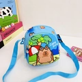 Blue Capybara crossbody bag for kids featuring adjustable straps and beach print - Light Blue