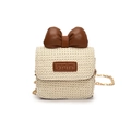 Mini cream straw bag for kids featuring a large brown leather bow and golden chain strap - Brown