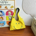 Bright yellow canvas crossbody bag featuring a blue embroidered smiley face for kids - Yellow Small