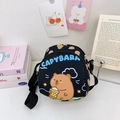 Black canvas round crossbody bag featuring cute cartoon Capybara printing for kids - Black