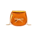 Metallic orange kids crossbody bag with a gold bow accent and a fine chain strap - Orange