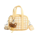 Yellow checkered mini handbag for kids with a cute brown plush bear pendant charm - Yellow
