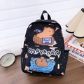 Black school backpack with cute cartoon Capybara print and I don't care slogan text - Black