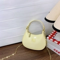 Mini semi-circle crossbody bag in pale yellow with chain strap and embossed logo - Yellow