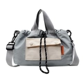 Minimalist grey drawstring bucket bag with dual-buckle front pocket for casual commute - Haze Blue