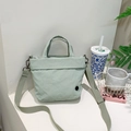 Light green canvas messenger bag for children with wide shoulder strap and hand handle - Bean Green