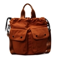 Caramel canvas drawstring bucket bag with multiple pockets and adjustable strap - Orange