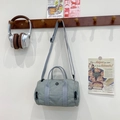 Light grey-green nylon barrel bag for kids featuring adjustable straps and dual handles - Gray